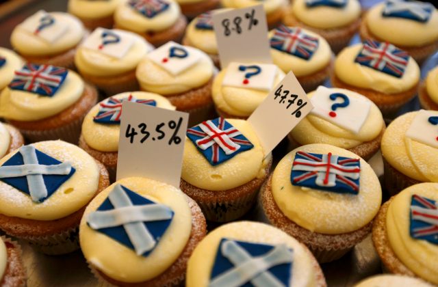 Cup cakes are displayed in the window of Cuckoo's bakery in Edinburgh