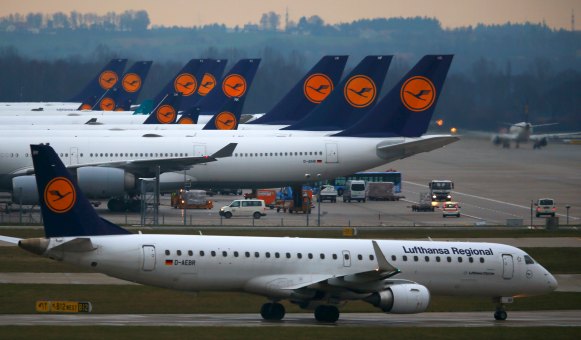 Planes of German flagship carrier Lufthansa are parked on tarmac at Munich's airport