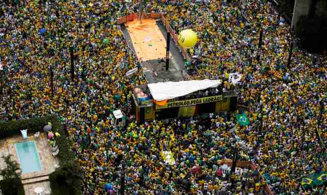 Demonstrators gather during a protest against Brazil's President Dilma Rousseff at Paulista avenue in Sao Paulo