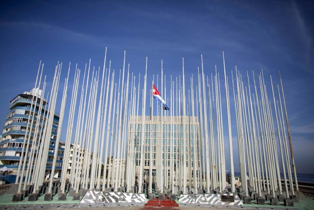 A Cuban flag flies in front of the U.S. Interests Section in Havana