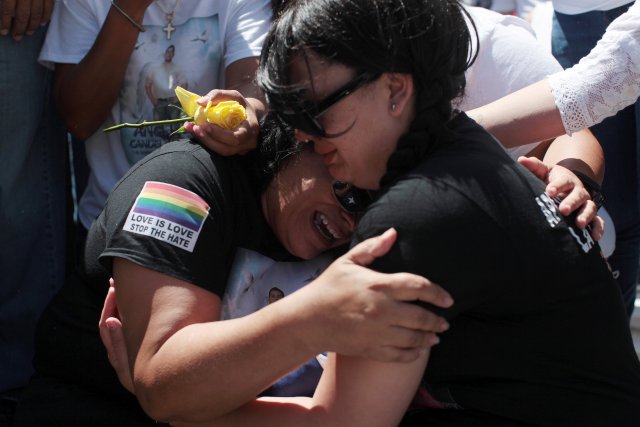 Lucyvette Padro accompanied by family and friends attends the funeral of her son Angel Candelario, one of the victims of the shooting at the Pulse night club in Orlando, at his hometown of Guanica, Puerto Rico
