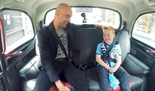 Pep Guardiola y el niño Braydon Bent. Foto: Manchester City