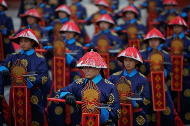 Performers take a part in a re-enactment of an ancient Qing Dynasty ceremony as the Lunar New Year of the Rooster is celebrated at the temple fair at Ditan Park (the Temple of Earth), in Beijing, China January 28, 2017. REUTERS/Damir Sagolj