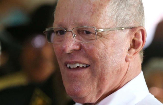 FILE PHOTO - Peru's President Pedro Pablo Kuczynski visits the home for elderly "Hermanitas de Los Desamparados" to celebrate Christmas in Lima, Peru, December 19, 2016. REUTERS/Mariana Bazo/File Photo