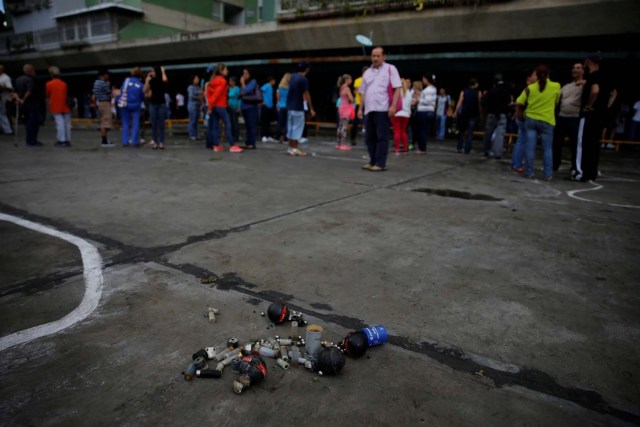 Gathered debris including tear gas grenades, tear gas cartridges, marbles and metal balls are seen on the floor where opposition supporters and security forces clashed in and outside a residential building on Tuesday according to residents, in Caracas, Venezuela June 14, 2017. REUTERS/Ivan Alvarado