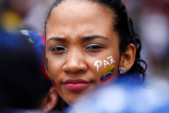 A woman attends a rally against Venezuela's President Nicolas Maduro's Government in Caracas, Venezuela, June 24, 2017. REUTERS/Christian Veron