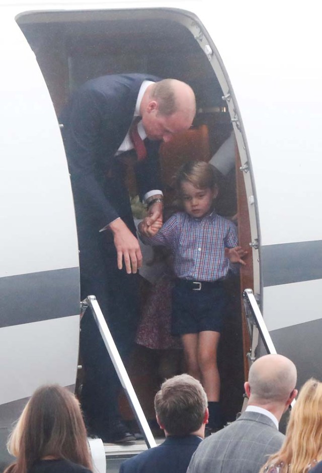 Prince William, the Duke of Cambridge, his wife Catherine, The Duchess of Cambridge, Prince George and Princess Charlotte arrive at a military airport in Warsaw, Poland July 17, 2017. REUTERS/Kacper Pempel