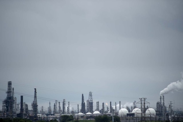 Refineries are seen in the aftermath of Hurricane Harvey August 27, 2017 in Houston, Texas. Hurricane Harvey left a trail of devastation after the most powerful storm to hit the US mainland in over a decade slammed into Texas, destroying homes, severing power supplies and forcing tens of thousands of residents to flee. / AFP PHOTO / Brendan Smialowski