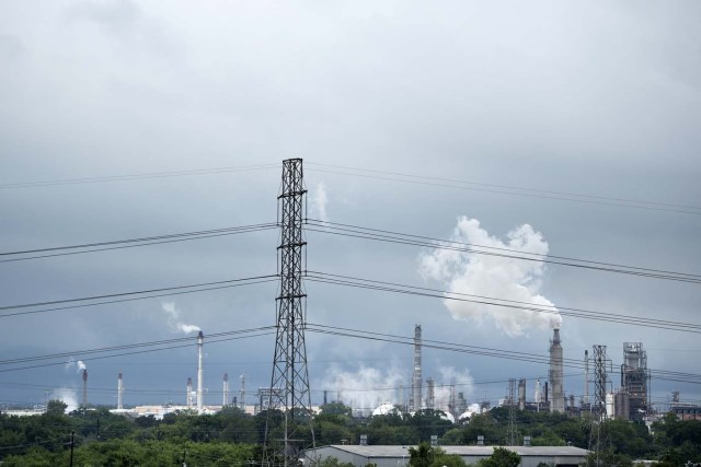 Refineries are seen in the aftermath of Hurricane Harvey August 27, 2017 in Houston, Texas. Hurricane Harvey left a trail of devastation after the most powerful storm to hit the US mainland in over a decade slammed into Texas, destroying homes, severing power supplies and forcing tens of thousands of residents to flee. / AFP PHOTO / Brendan Smialowski