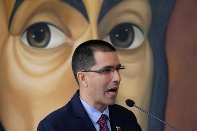 Venezuela's Foreign Minister Jorge Arreaza delivers a speech in front of a graffiti of Venezuela's national hero Simon Bolivar, during a meeting of accredited diplomatic teams in Caracas, Venezuela August 12, 2017. REUTERS/Carlos Garcia Rawlins