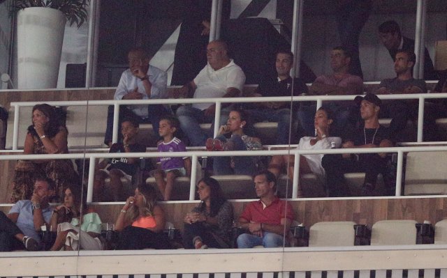 Soccer Football - Real Madrid vs Barcelona - Spanish Super Cup Second Leg - Madrid, Spain - August 16, 2017   Real Madrid’s Cristiano Ronaldo sits in the stands with his family     REUTERS/Sergio Perez