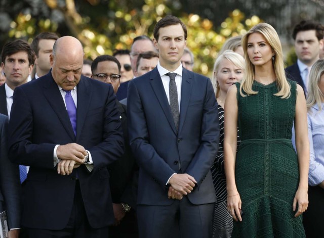 White House senior adviser Ivanka Trump, husband and fellow senior adviser Jared Kushner (C), and White House Chief Economic Adviser Gary Cohn attend a remembrance of the September 11 attacks on the United States, at the White House in Washington, U.S., September 11, 2017. REUTERS/Kevin Lamarque