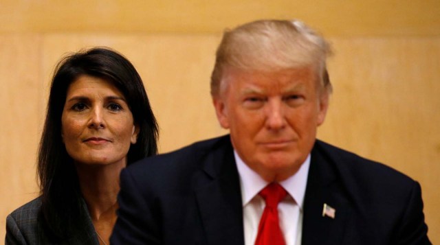U.S. Ambassador to the UN Nikki Haley (L) and U.S. President Donald Trump participate in a session on reforming the United Nations at UN Headquarters in New York, U.S., September 18, 2017. REUTERS/Kevin Lamarque