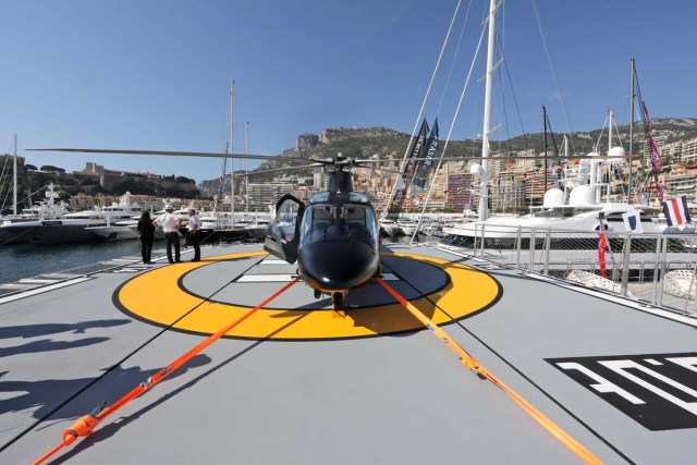 An helicopter is seen on the deck of the "Game Changer" a 69.15 meters super yacht during the Monaco Yacht show, one of the most prestigious pleasure boat show in the world, highlighting hundreds of yachts for the luxury yachting industry and welcomes 580 leading companies, in the port of Monaco, September 27, 2017. REUTERS/Eric Gaillard