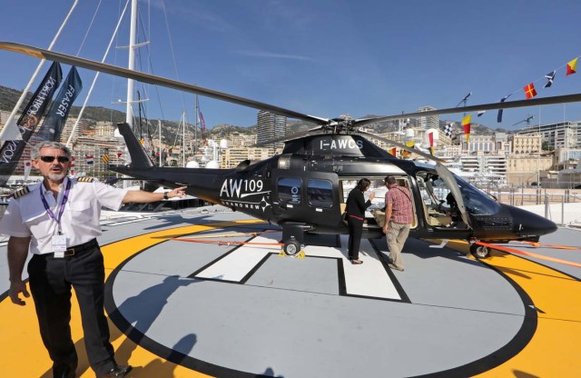 An helicopter is seen on the deck of the "Game Changer" a 69.15 meters super yacht during the Monaco Yacht show, one of the most prestigious pleasure boat show in the world, highlighting hundreds of yachts for the luxury yachting industry and welcomes 580 leading companies, in the port of Monaco, September 27, 2017. REUTERS/Eric Gaillard