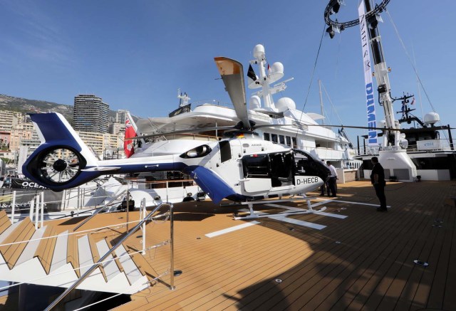 An Airbus H135 helicopter is seen on the deck of a super yacht during the Monaco Yacht show, one of the most prestigious pleasure boat show in the world, highlighting hundreds of yachts for the luxury yachting industry and welcomes 580 leading companies, in the port of Monaco, September 27, 2017. REUTERS/Eric Gaillard
