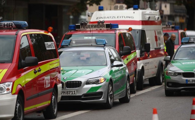 Firefighters, police and first aid vehicles are seen at the site where earlier a man injured several people in a knife attack in Munich, Germany, October 21, 2017.