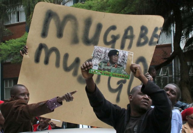 Protesters calling for Zimbabwean President Robert Mugabe to step down take to the streets in Harare, Zimbabwe, November 18, 2017. REUTERS/Philimon Bulawayo