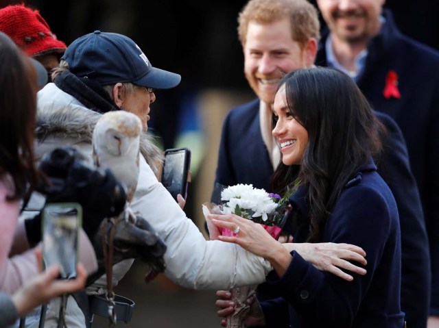 Britain's Prince Harry and his fiancee Meghan Markle greet well wishers as they arrive at an event in Nottingham, December 1, 2017. REUTERS/Eddie Keogh