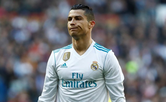 Soccer Football - La Liga Santander - Real Madrid vs FC Barcelona - Santiago Bernabeu, Madrid, Spain - December 23, 2017 Real Madrid’s Cristiano Ronaldo looks dejected REUTERS/Juan Medina