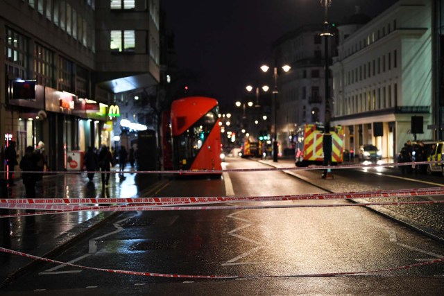 Police tape blocks the Strand near Charing Cross station after it was shut due to a gas leak, in London, Britain, January 23, 2018. REUTERS/Dylan Martinez