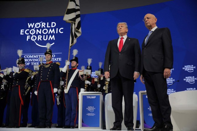 U.S. President Donald Trump and Klaus Schwab, Founder and Executive Chairman of the WEF, look on during the World Economic Forum (WEF) annual meeting in Davos, Switzerland January 26, 2018. REUTERS/Carlos Barria