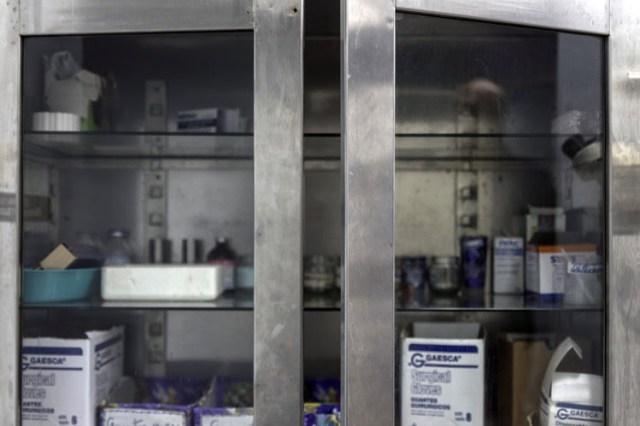 A sparse medical cabinet at a public hospital in Lechera, Venezuela. PHOTO: MARCELO PEREZ DEL CARPIO/BLOOMBERG NEWS