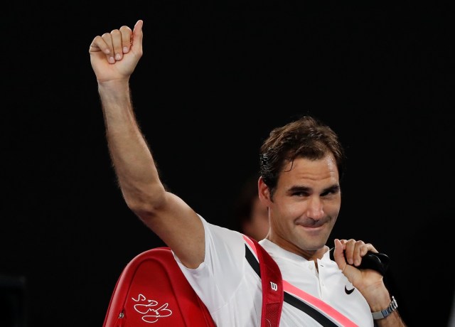 Tennis - Australian Open - Semifinals - Rod Laver Arena, Melbourne, Australia, January 26, 2018. Switzerland's Roger Federer celebrates after winning his match against South Korea's Chung Hyeon. REUTERS/Issei Kato