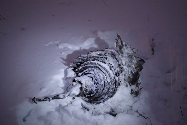 A part of a Saratov Airlines Antonov AN-148 plane that crashed after taking off from Moscow's Domodedovo airport, is seen at the scene of the incident outside Moscow, Russia February 11, 2018. REUTERS/Maxim Shemetov TPX IMAGES OF THE DAY