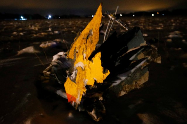 A part of a Saratov Airlines Antonov AN-148 plane that crashed after taking off from Moscow's Domodedovo airport, is seen at the scene of the incident outside Moscow, Russia February 11, 2018. REUTERS/Sergei Karpukhin