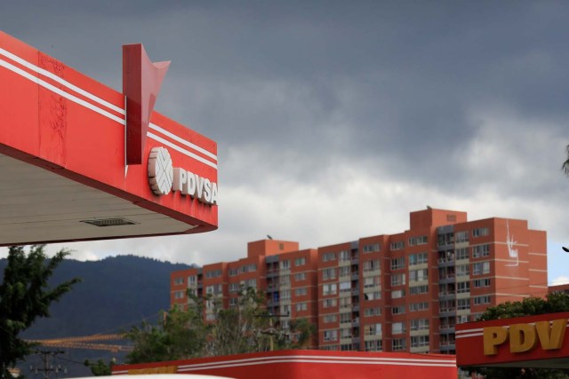 The corporate logo of the state oil company PDVSA is seen at a gas station in Caracas, Venezuela February 24, 2018. Picture taken February 24, 2018. REUTERS/Marco Bello