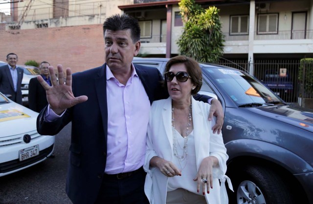 Paraguayan presidential candidate Efrain Alegre and his wife Mirian Irun arrive for a meeting with the media in Asuncion, during national election day, Paraguay April 22, 2018. REUTERS/Jorge Adorno