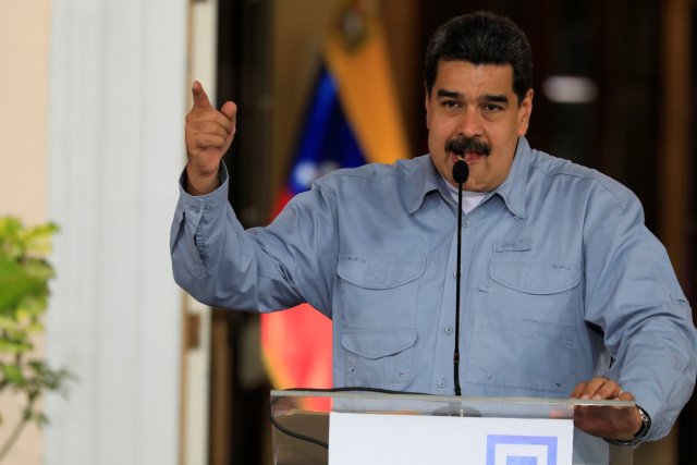 Venezuela's President Nicolas Maduro speaks during a gathering with supporters at Miraflores Palace in Caracas, Venezuela April 4, 2018. REUTERS/Marco Bello