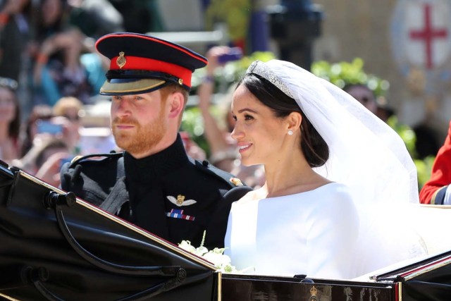 Meghan Markle and Prince Harry leave St George's Chapel at Windsor Castle after their wedding Saturday May 19, 2018. Gareth Fuller/Pool via REUTERS